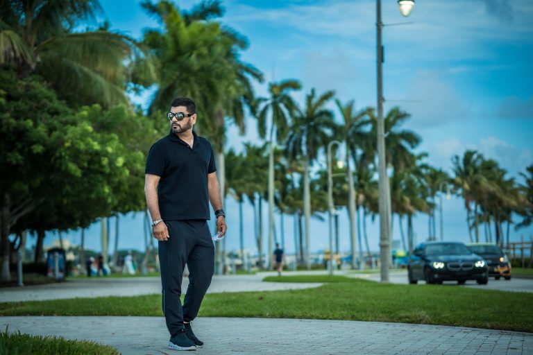 Man on South Florida boulevard at dusk